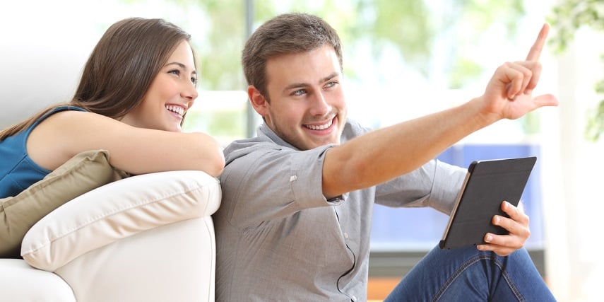 Couple shopping for home decorations through a Magento product configurator