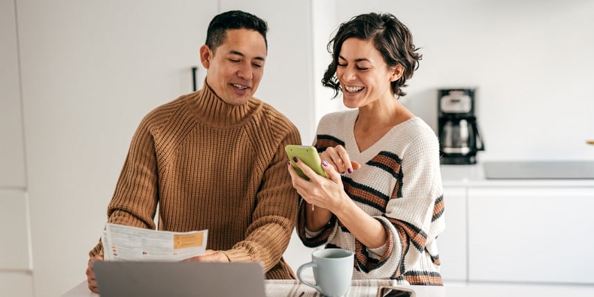 Couple using SAP product configuration to customize a safe for their home