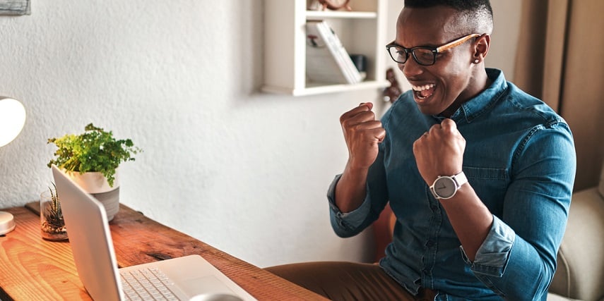 Excited business owner seeing better engagement with 3D for eCommerce