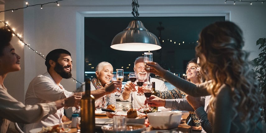 Family dinner under a new light fixture customized in a Shopify product customizer