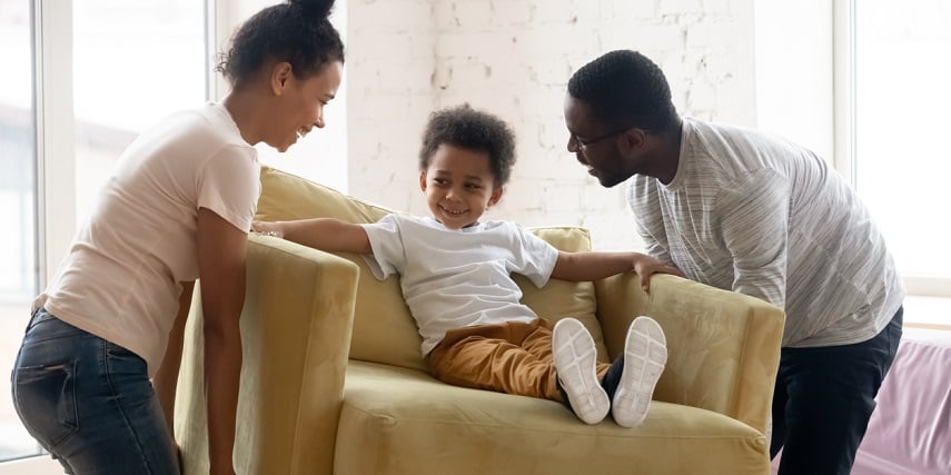 Family with a new chair they ordered online through a product customization tool