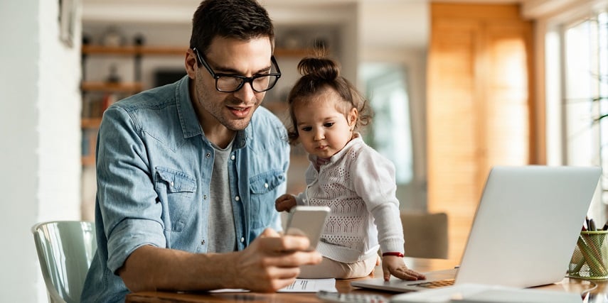 Father and daughter looking at 3D car customization online options