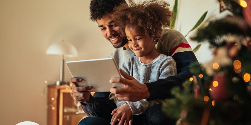 Father and daughter using a product customizer to create the perfect gift