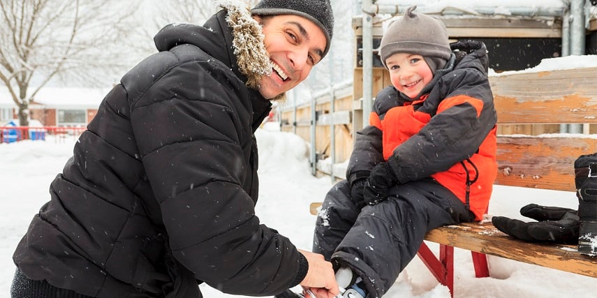 Father and son ice skating in custom gear made in a BigCommerce product configurator