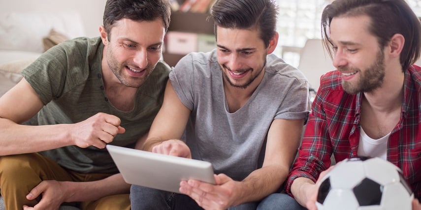 Friends browsing through a 360 photo web viewer to buy gear from their favorite sports teams