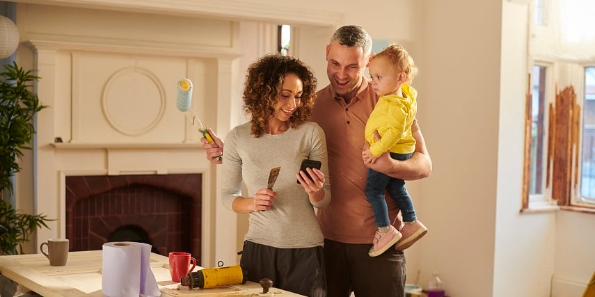 Homeowners looking at a visual configurator to choose a bathroom sink