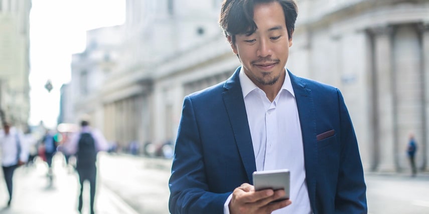 Man buying a suit in a Shopify product customizer after a previous good experience