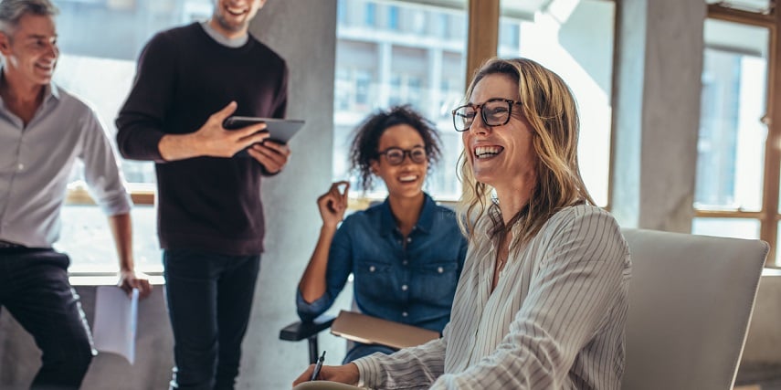 Marketing team looking at improved analytics after implementing a Shopify product customizer