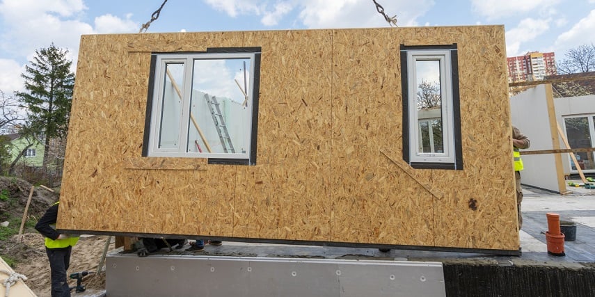 Modular building wall being assembled on-site