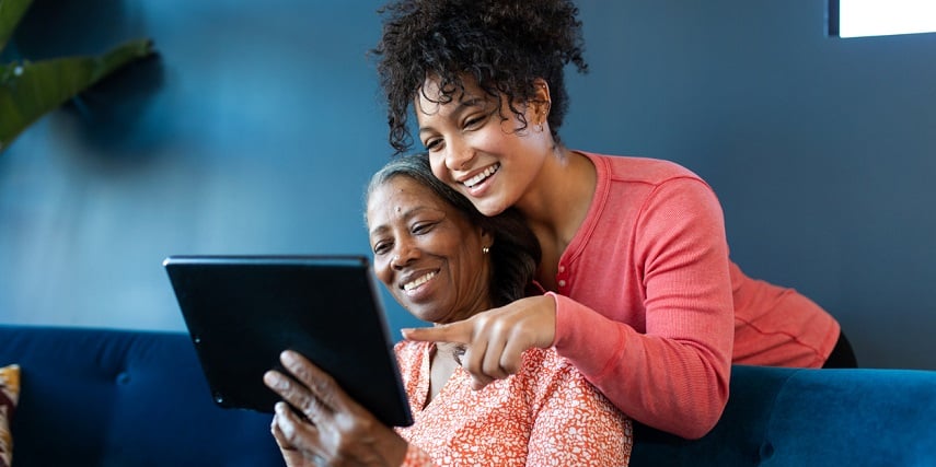 Mother and daughter browsing on a furniture website with virtual photography