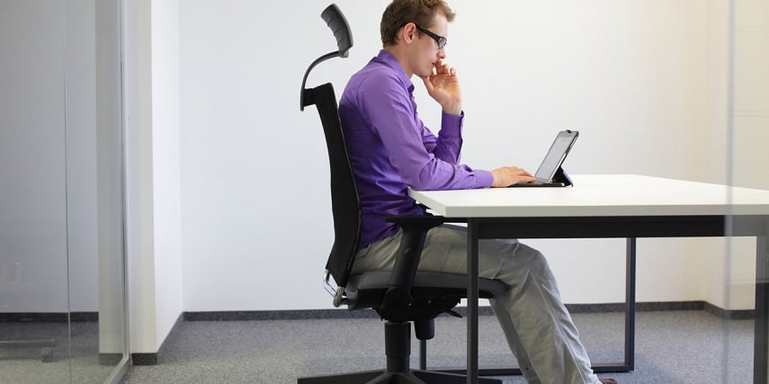 Salesperson using office furniture created through a Salesforce product configurator