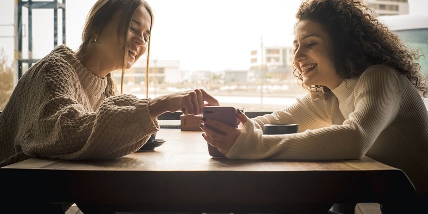 Two friends looking at modern replacements to 360 product view Flash tools