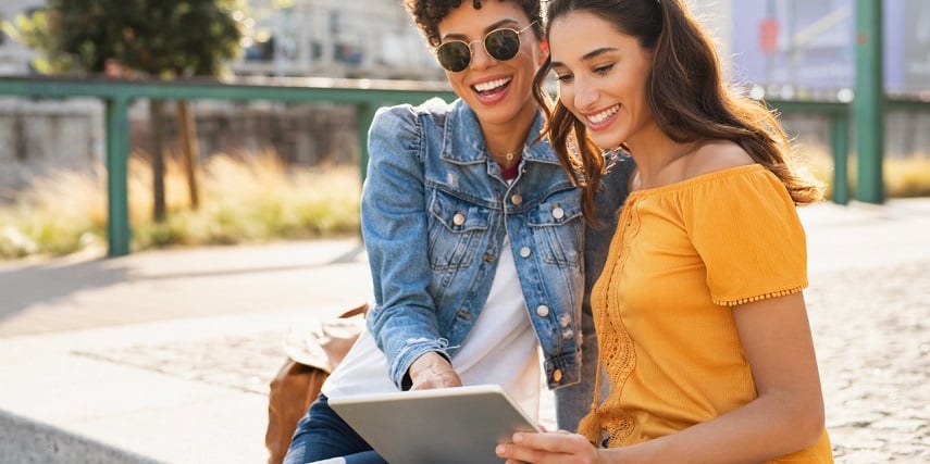 Two shoppers enjoying the product customization and shopping process online