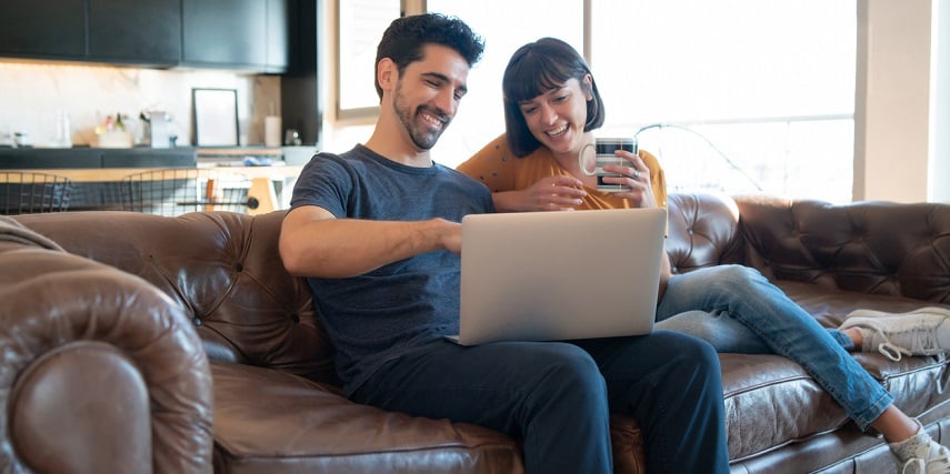 Two shoppers looking at product images created through virtual photography