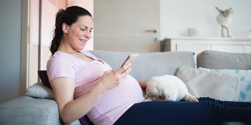 Woman looking through product customization options for furniture