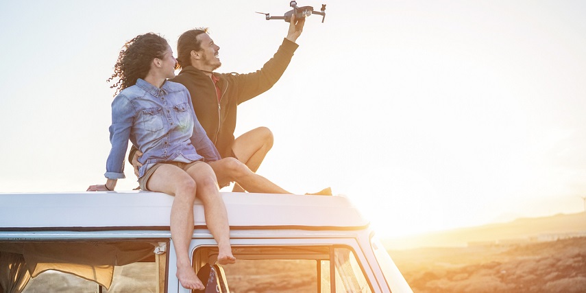 Couple testing a drone they created through a drone configurator