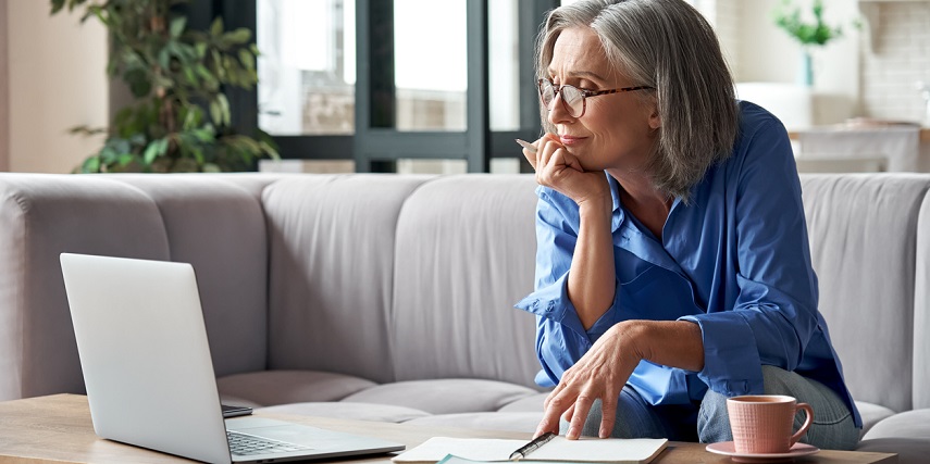 Woman evaluating a product in a Shopify product customizer